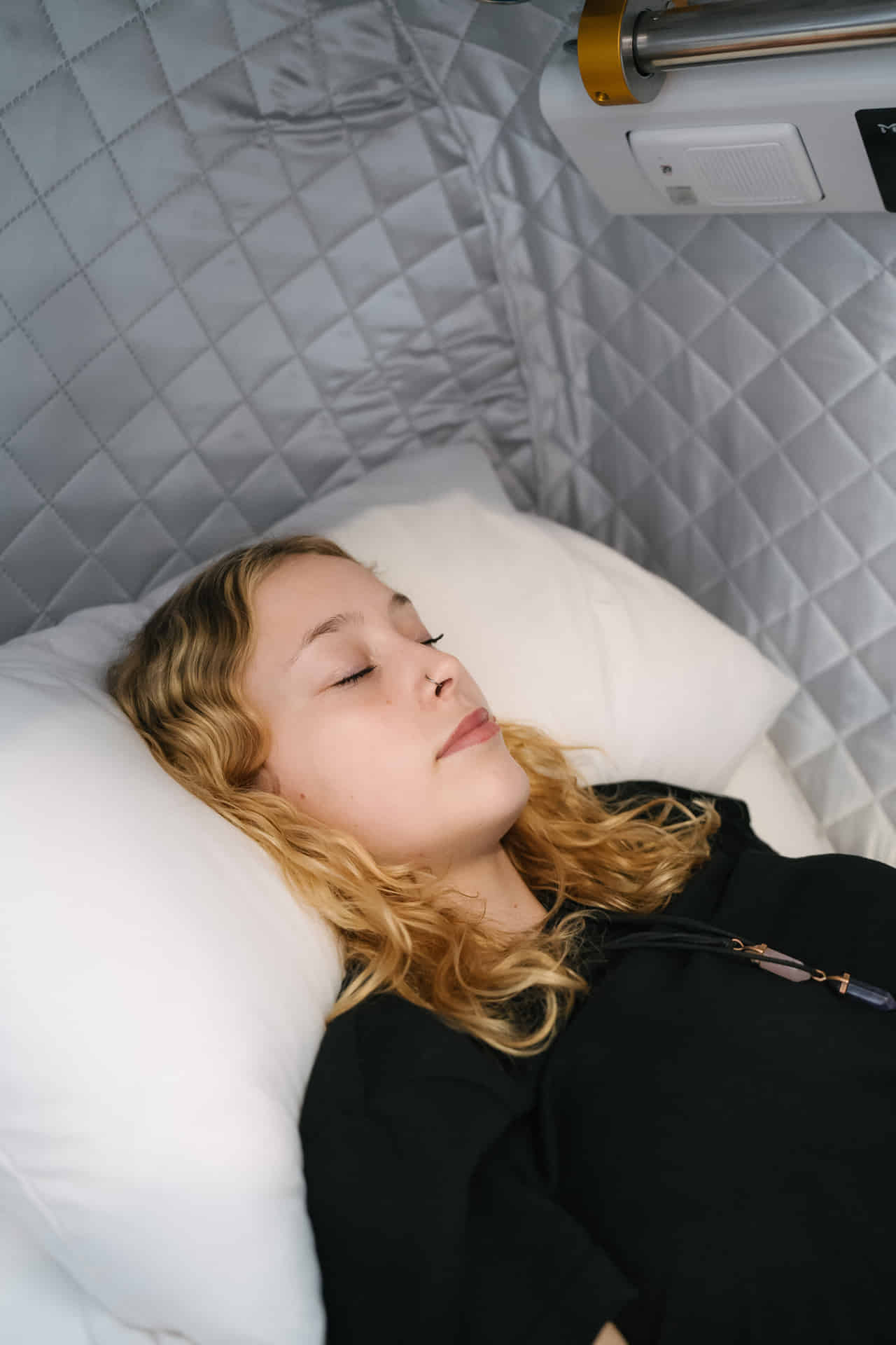 Woman inside hyperbaric chamber