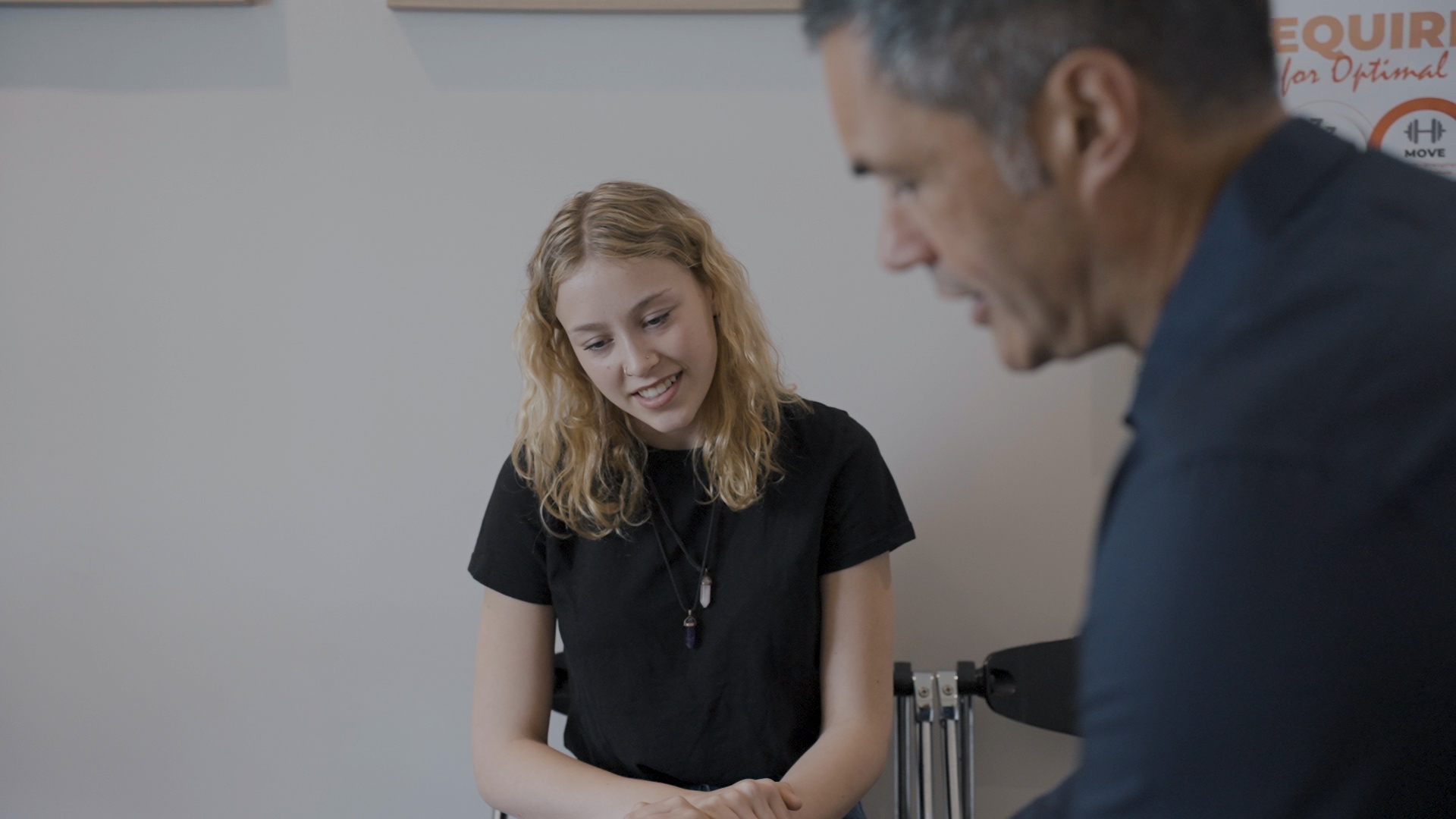 Dr Dean having a consultation with a patient